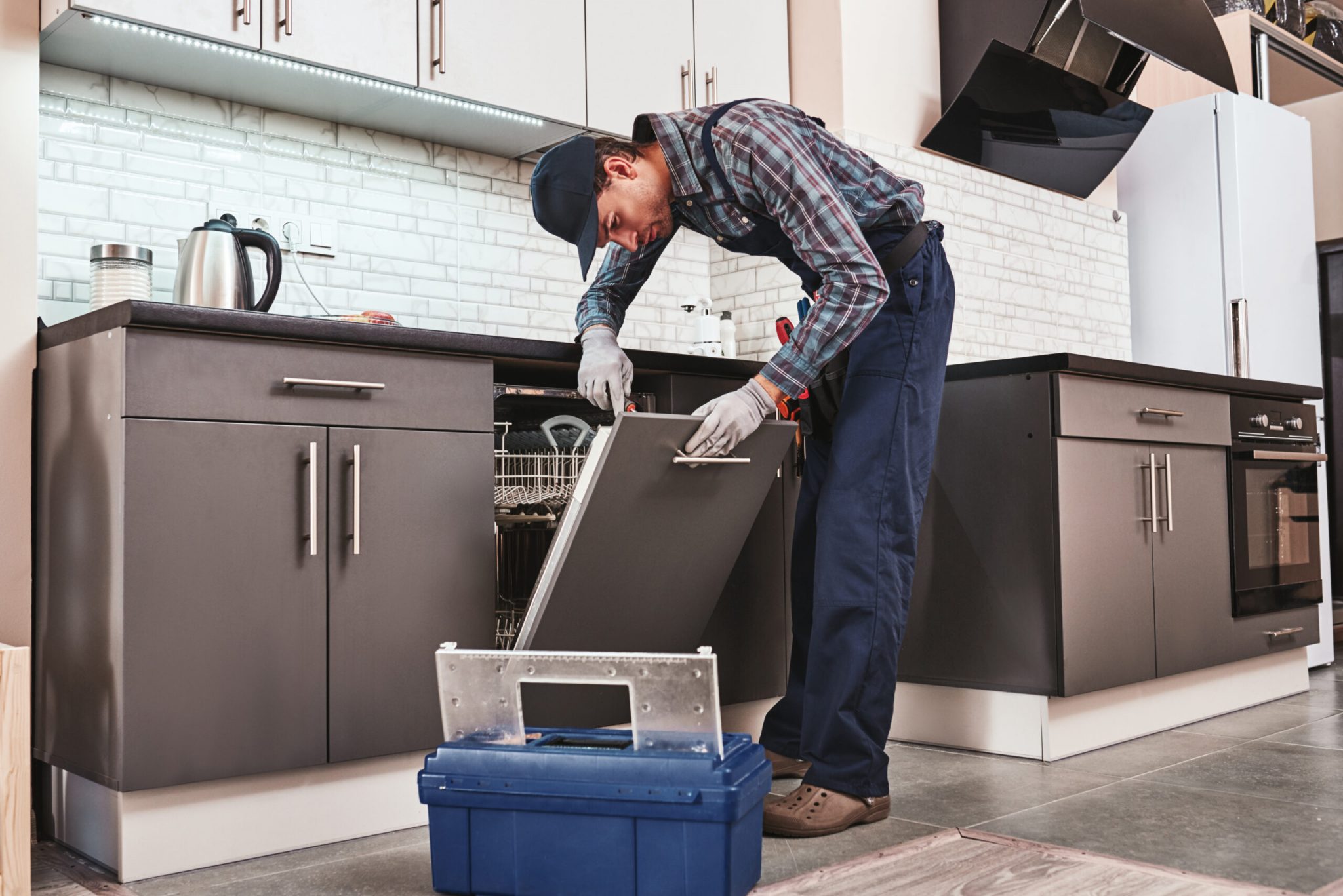 Dishwasher Repair Winnipeg Same Day Appliance Repair PROFIXIT   Service In Time Male Technician Sitting Near Dishw K346J3V Scaled 1 2048x1367 