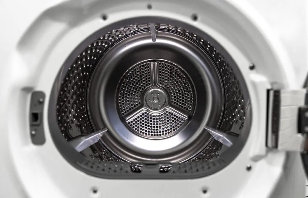 Replacement parts for appliances beside the open drum of a washer