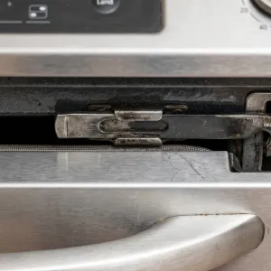 Oven door stuck in self-clean lock position